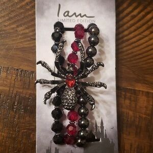 I am limited edition glass bead and spider bracelet